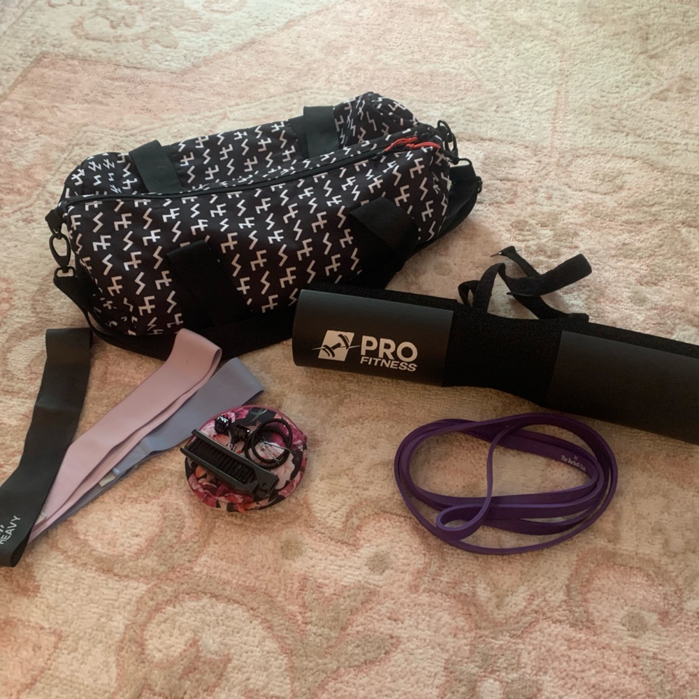 gym bag essentials! hair, resistance bands, pull up band, hip thrust pad, jump